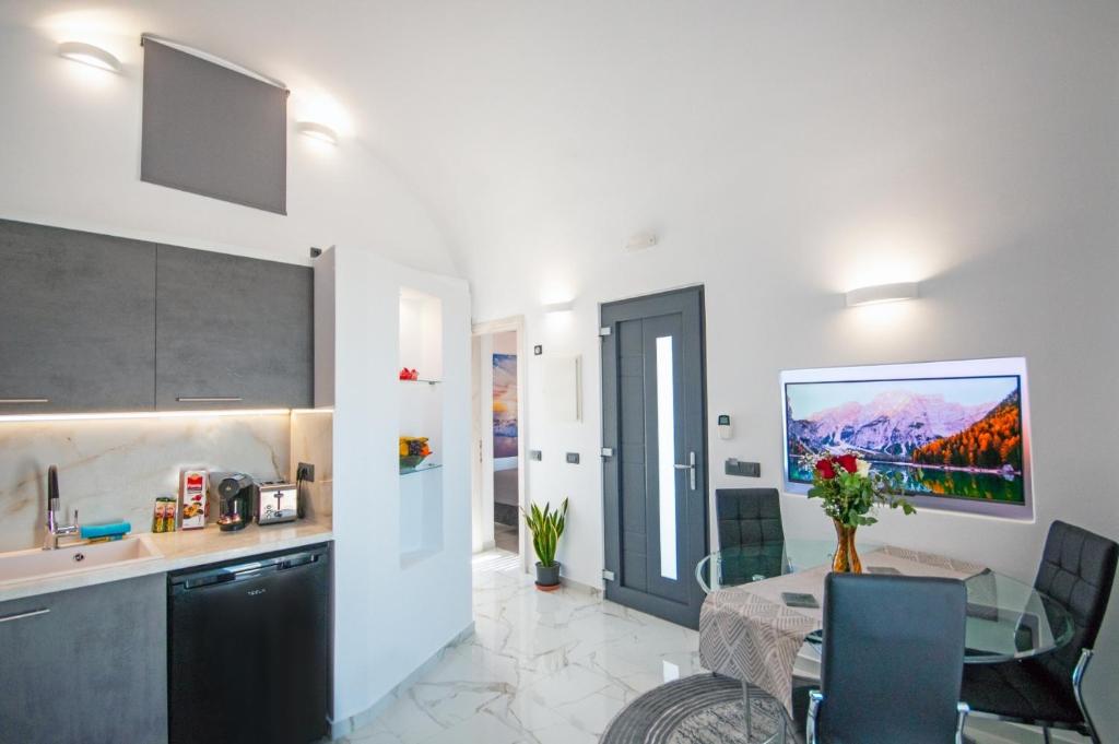 Kuchyň nebo kuchyňský kout v ubytování Elvis’ Home