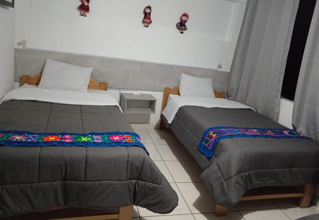 Katil atau katil-katil dalam bilik di HOSTAL La RASA