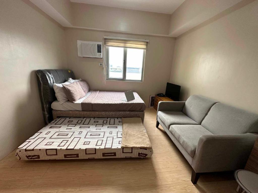 Χώρος καθιστικού στο Sunvida Tower Apartment Infront of SM City Cebu