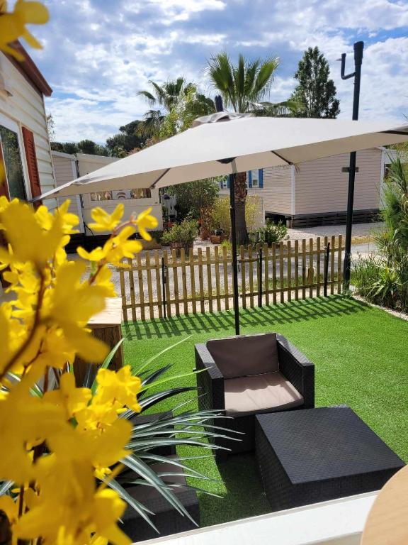 Zahrada ubytování Charmant mobil-home à 200 m des plages