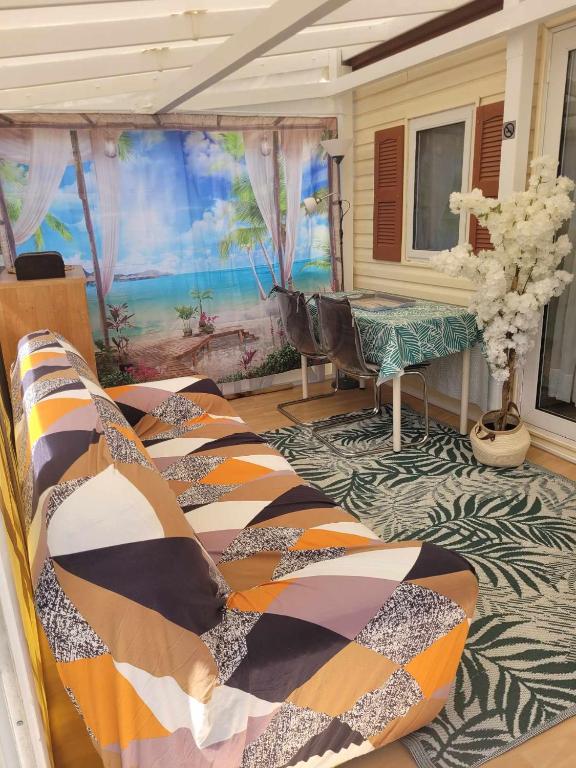 Posezení v ubytování Charmant mobil-home à 200 m des plages