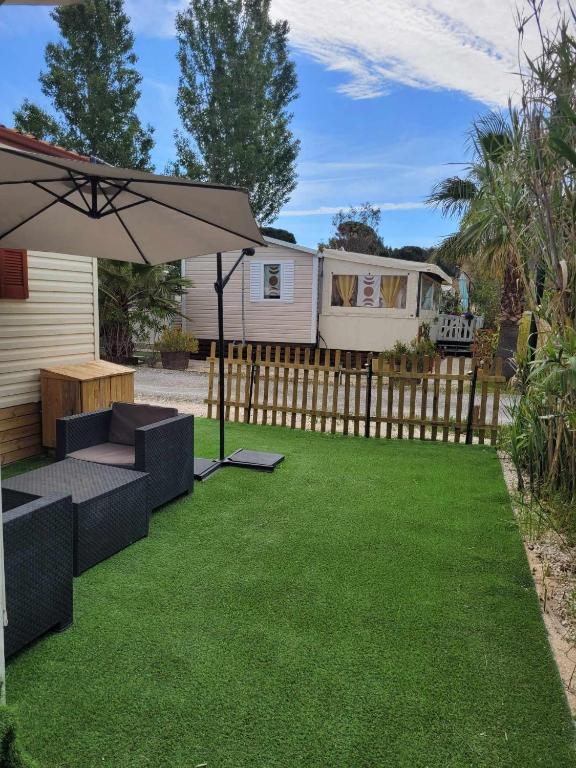 Zahrada ubytování Charmant mobil-home à 200 m des plages