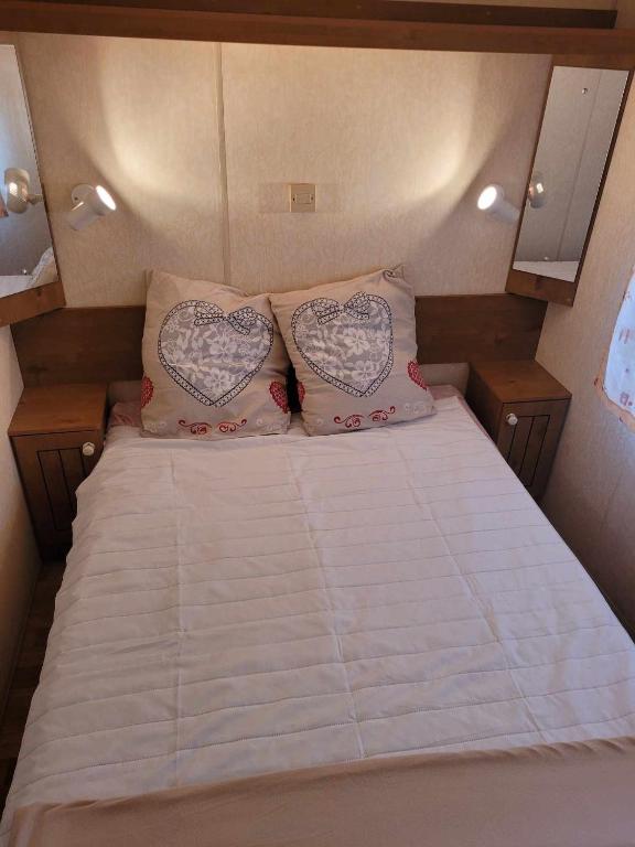 Postel nebo postele na pokoji v ubytování Charmant mobil-home à 200 m des plages