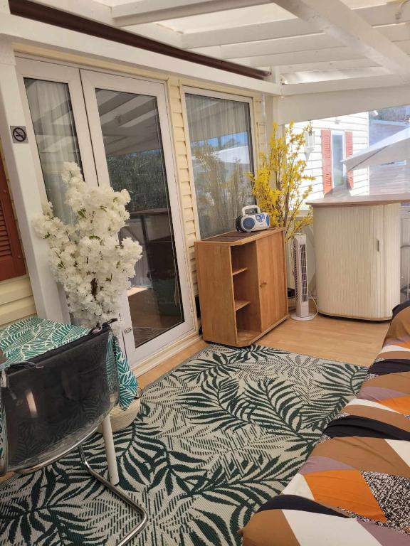 Posezení v ubytování Charmant mobil-home à 200 m des plages