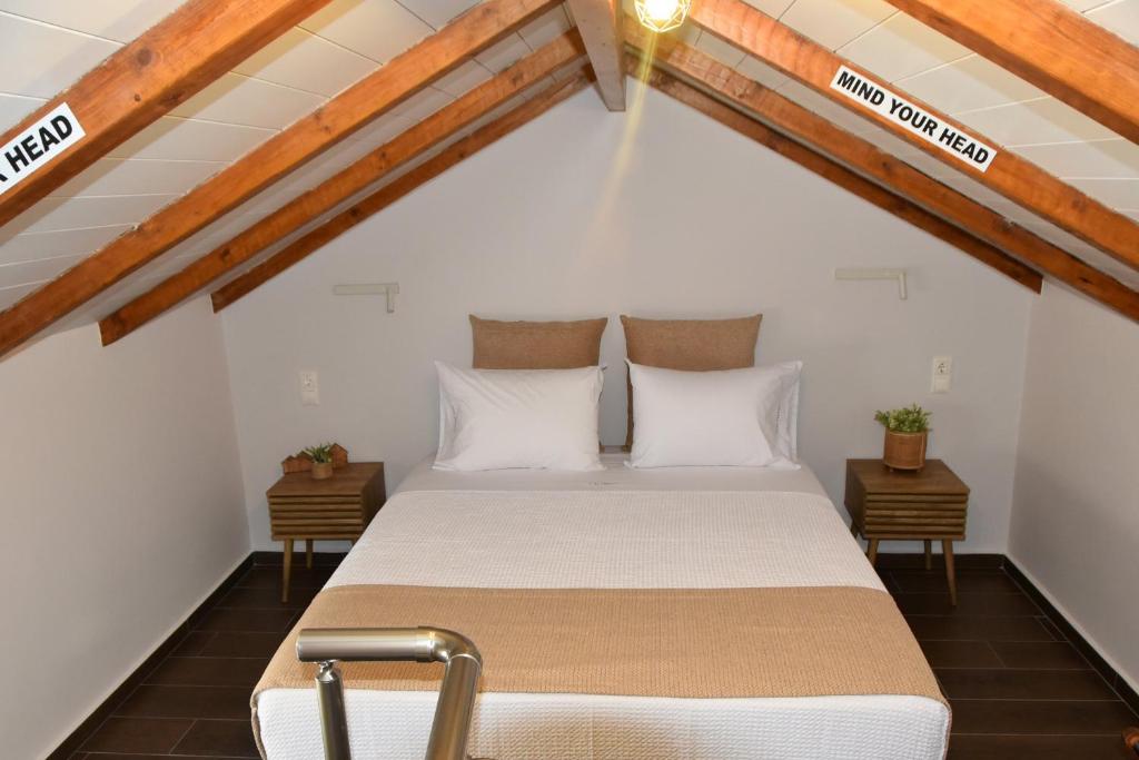 Postel nebo postele na pokoji v ubytování Casa Enetiko
