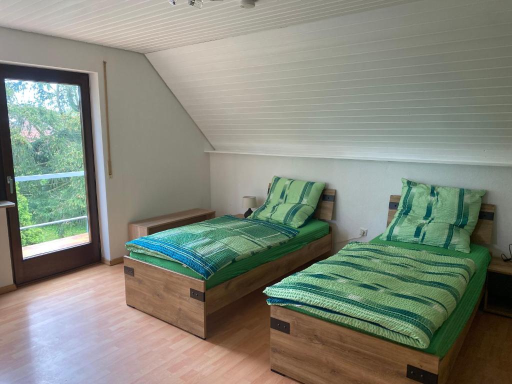 Posteľ alebo postele v izbe v ubytovaní Ferienwohnung Hagweg
