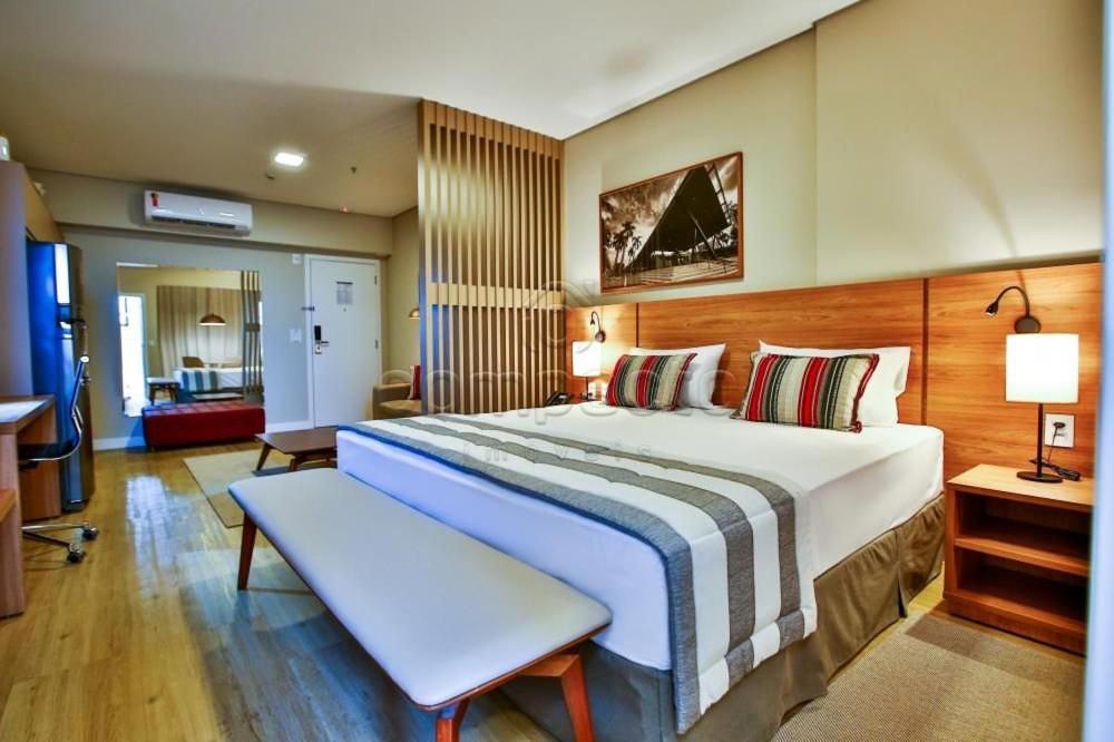Postel nebo postele na pokoji v ubytování Flat & Lounge SQUARE FARIA LIMA