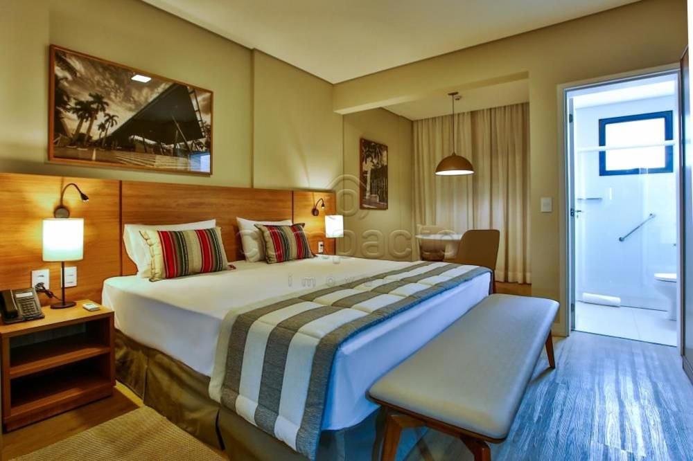 Postel nebo postele na pokoji v ubytování Flat & Lounge SQUARE FARIA LIMA
