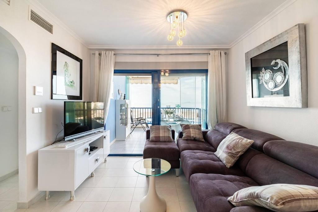 TV a/nebo společenská místnost v ubytování Lovely appartment with stunning sea view, 2nd floor