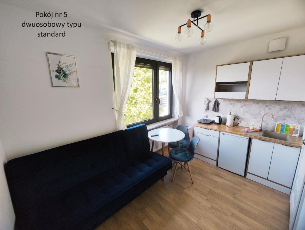 Kuchyň nebo kuchyňský kout v ubytování Apartamenty Monterska
