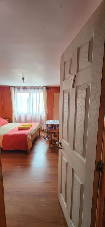 Postel nebo postele na pokoji v ubytování Hostal La nona
