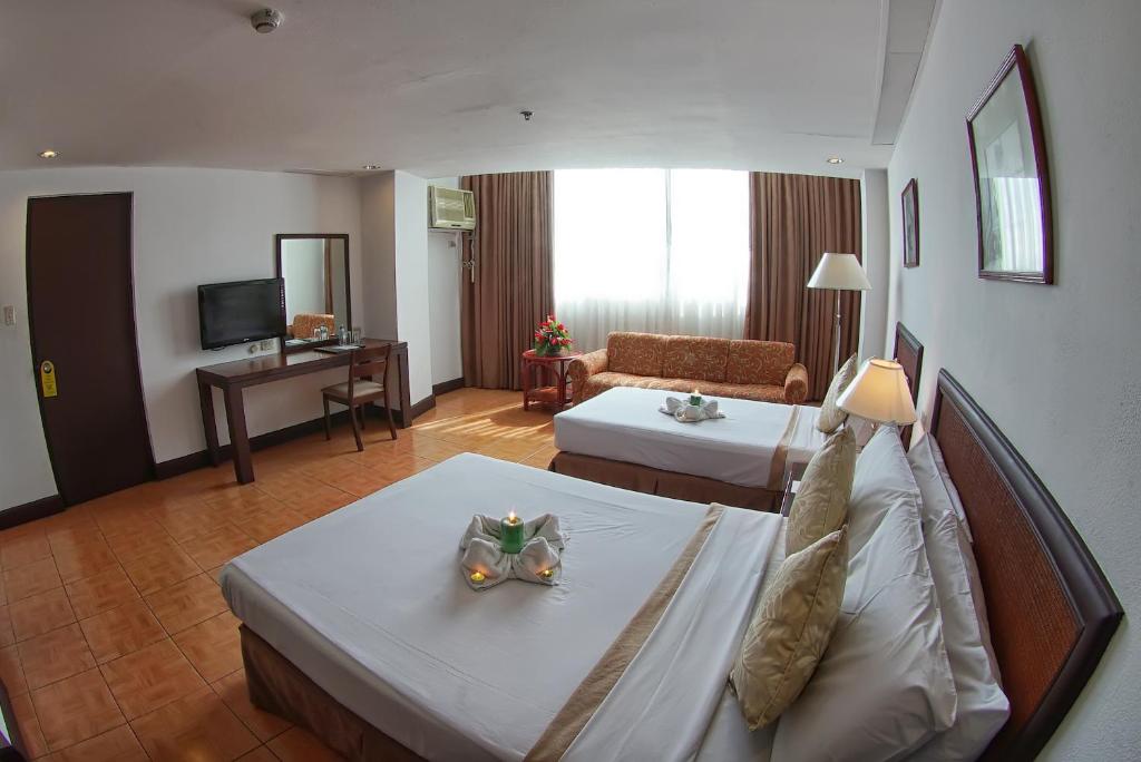 TV a/nebo společenská místnost v ubytování Rajah Park Hotel by Hiverooms