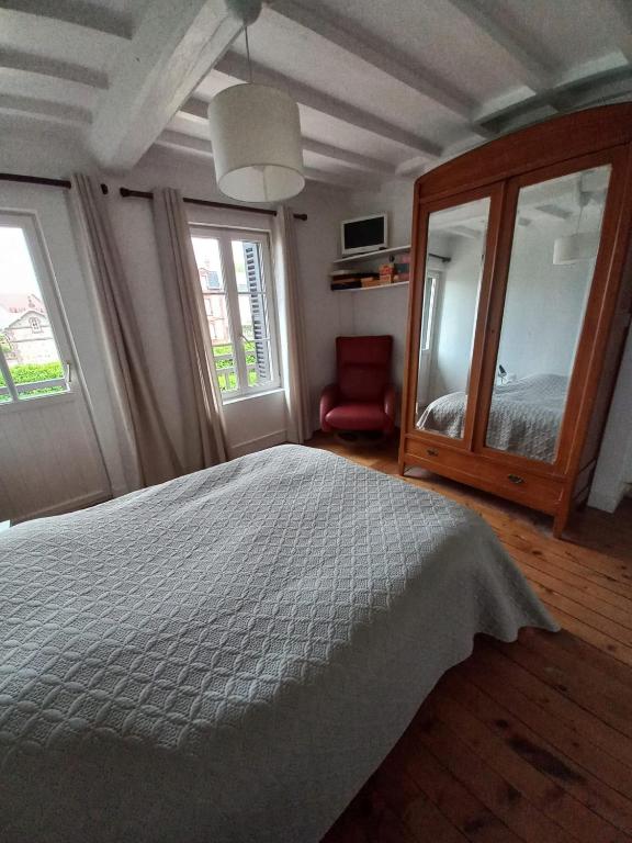 Postel nebo postele na pokoji v ubytování Une parenthèse en bord de mer