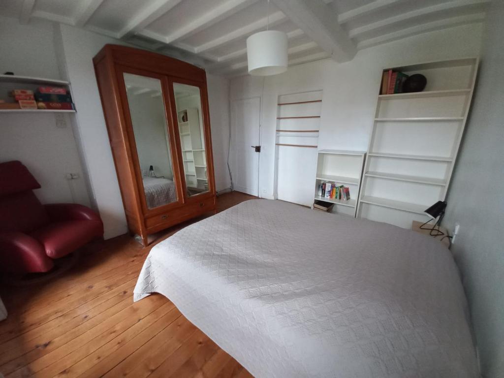 Postel nebo postele na pokoji v ubytování Une parenthèse en bord de mer