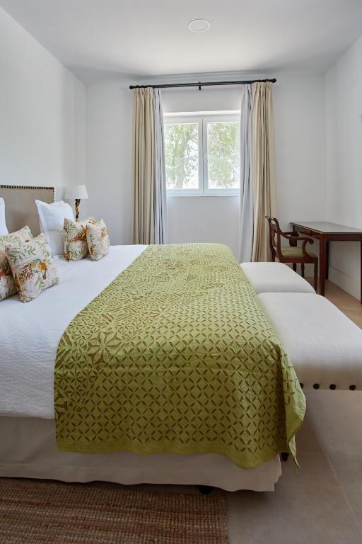 A bed or beds in a room at Finca La Fuensanta