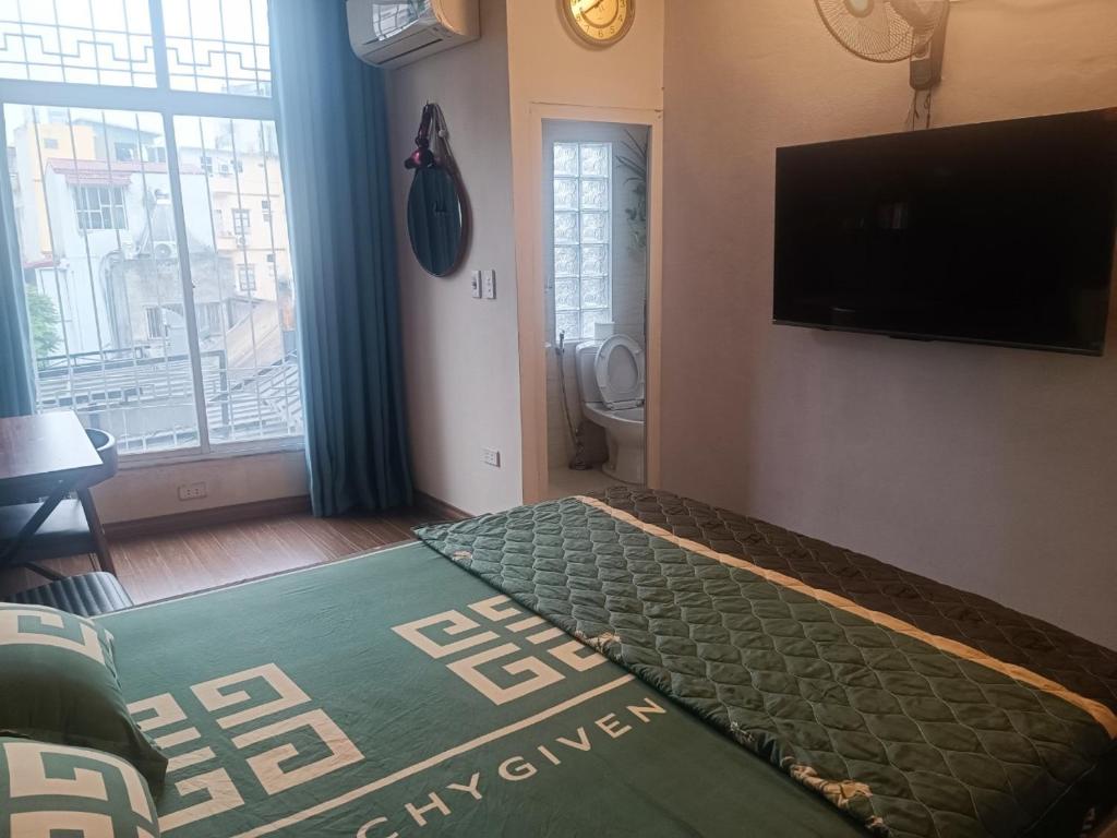 Letto o letti in una camera di Hoan Kiem lake center