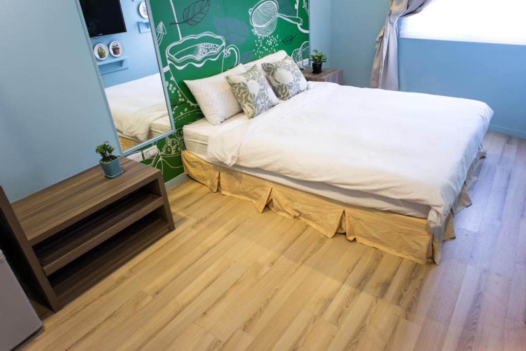 Postel nebo postele na pokoji v ubytování Bei Pin B&B