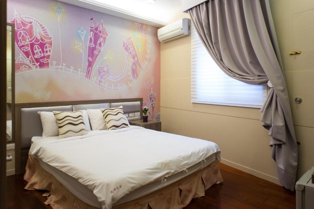 Postel nebo postele na pokoji v ubytování Bei Pin B&B