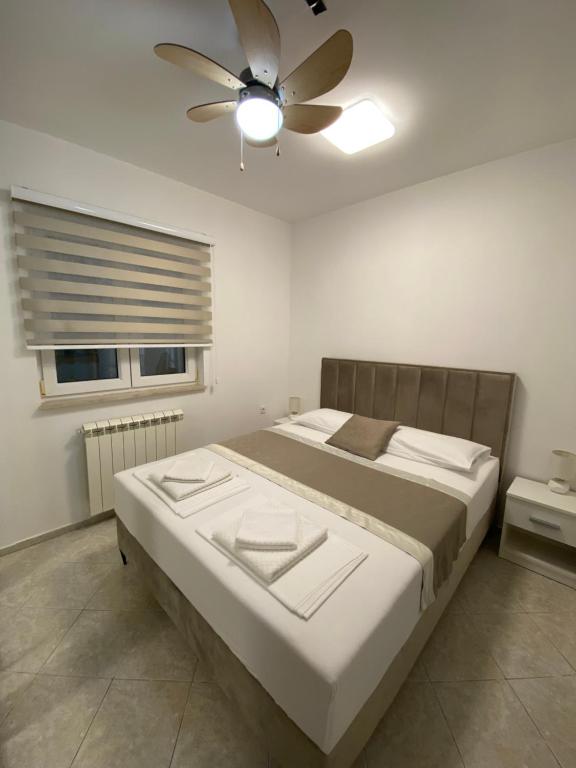 Posteľ alebo postele v izbe v ubytovaní Villa Lipovac Trogir