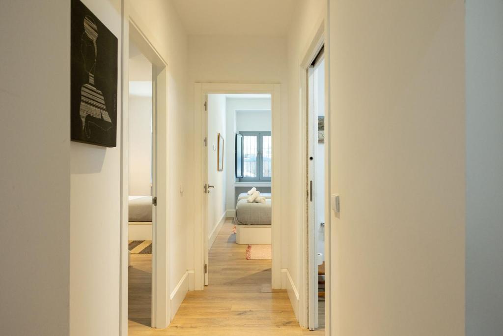 Łóżko lub łóżka w pokoju w obiekcie Art nest en Triana
