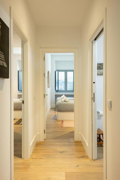 Łóżko lub łóżka w pokoju w obiekcie Art nest en Triana