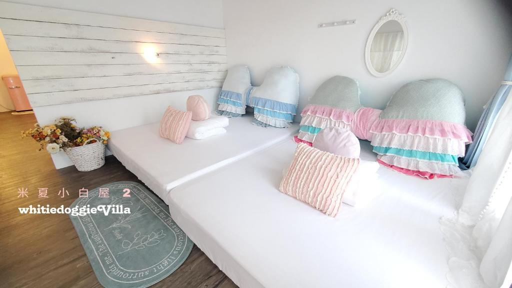 Postel nebo postele na pokoji v ubytování Whitiedoggie Villa II