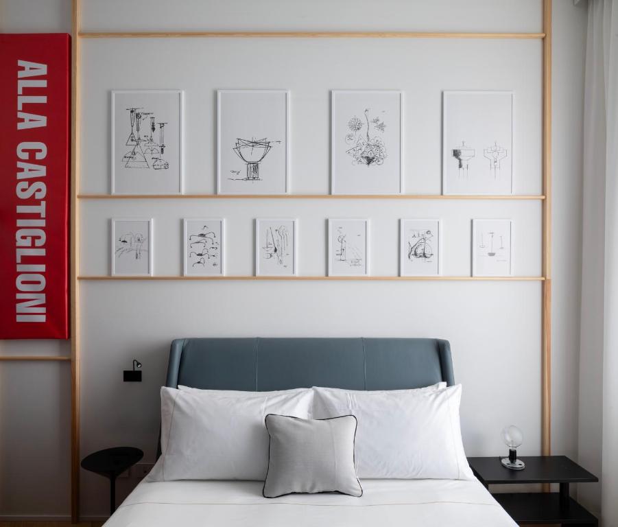 Postel nebo postele na pokoji v ubytování Interno Marche Design Experience Hotel