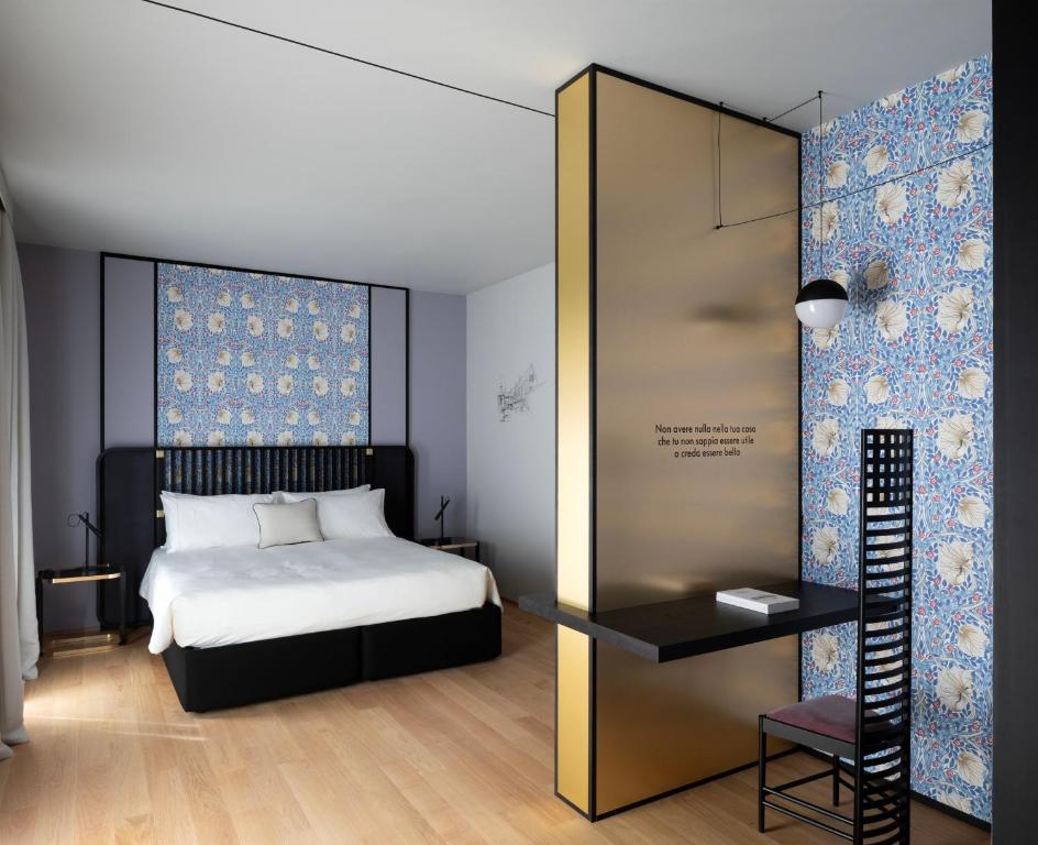 Postel nebo postele na pokoji v ubytování Interno Marche Design Experience Hotel