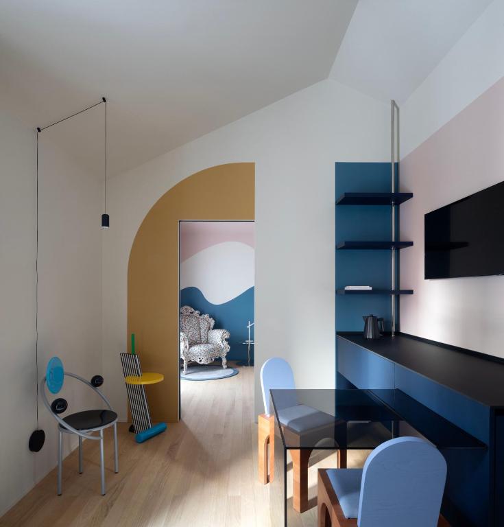 TV a/nebo společenská místnost v ubytování Interno Marche Design Experience Hotel