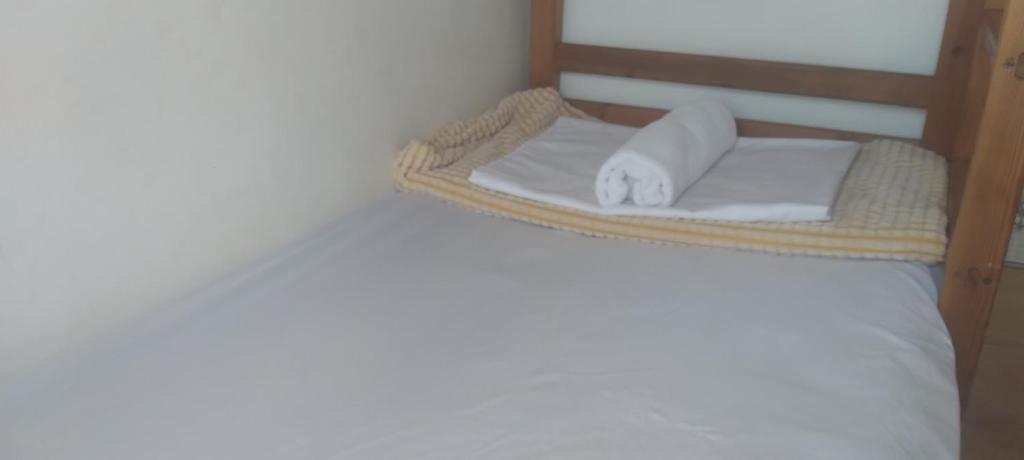 Postel nebo postele na pokoji v ubytování Idriss Seaview Guesthouse