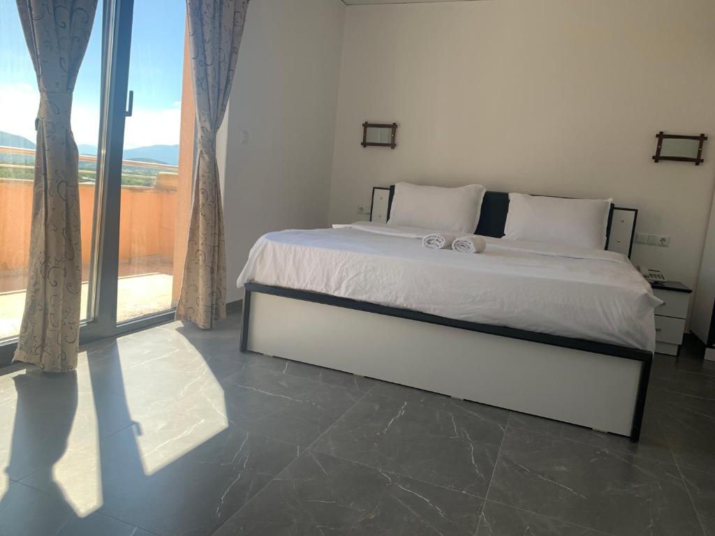 Postel nebo postele na pokoji v ubytování Hotel Albatros