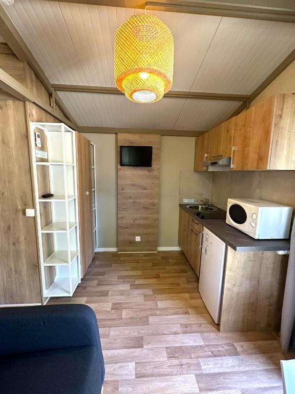 Kuchyň nebo kuchyňský kout v ubytování Camping Dolce Vita