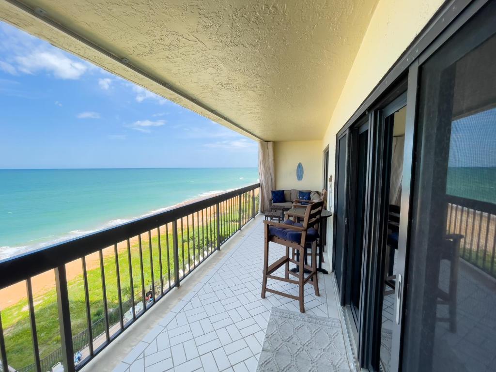 a balcony with a view of the ocean at Luxury, Direct Oceanfront Unit and Balcony, Northeast Corner, Heated Pool, Garage Parking in Ormond Beach