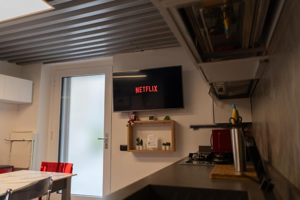 TV a/nebo společenská místnost v ubytování L' Asinello House wifi parking