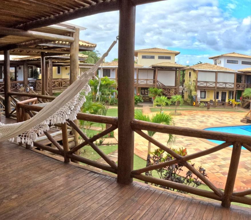 En balkon eller terrasse på Refúgio Amarelo na Praia da Espera