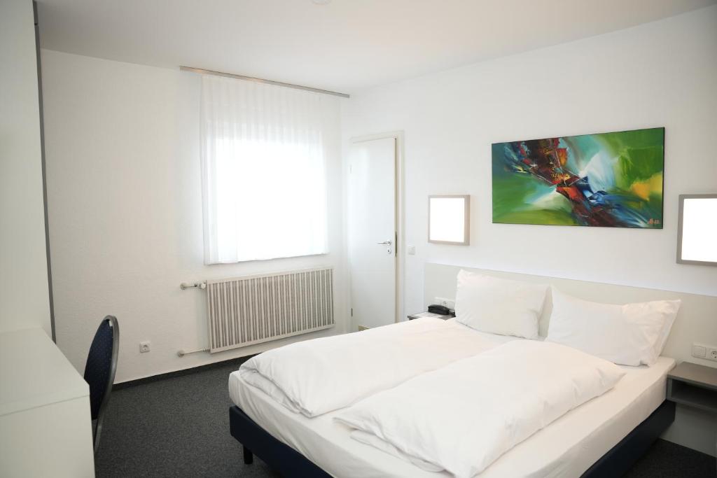 Postel nebo postele na pokoji v ubytování Weber Residenz