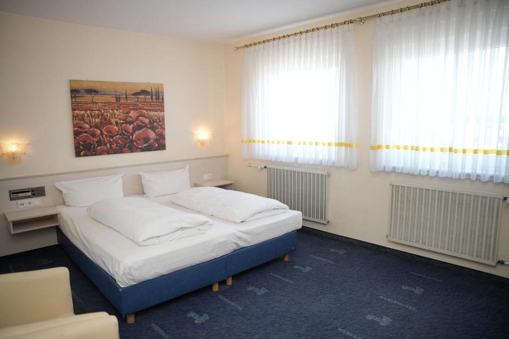Postel nebo postele na pokoji v ubytování Weber Residenz