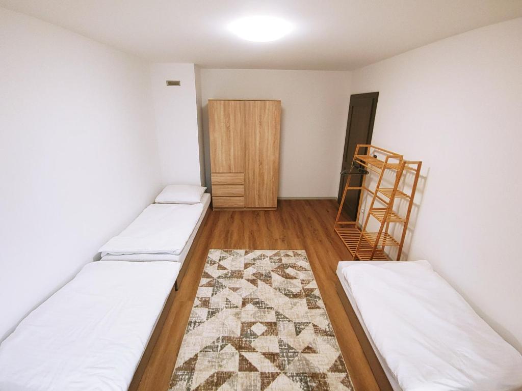 Postel nebo postele na pokoji v ubytování Palenčareň - Old Destilery