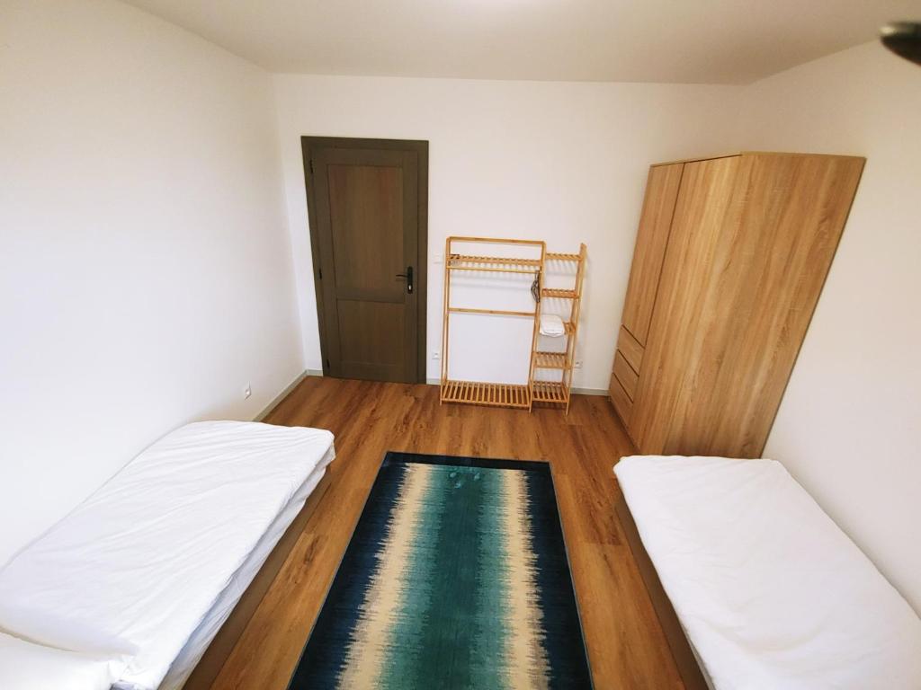 Postel nebo postele na pokoji v ubytování Palenčareň - Old Destilery