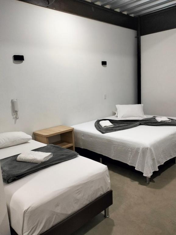 Postel nebo postele na pokoji v ubytování Hotel El Cordobes