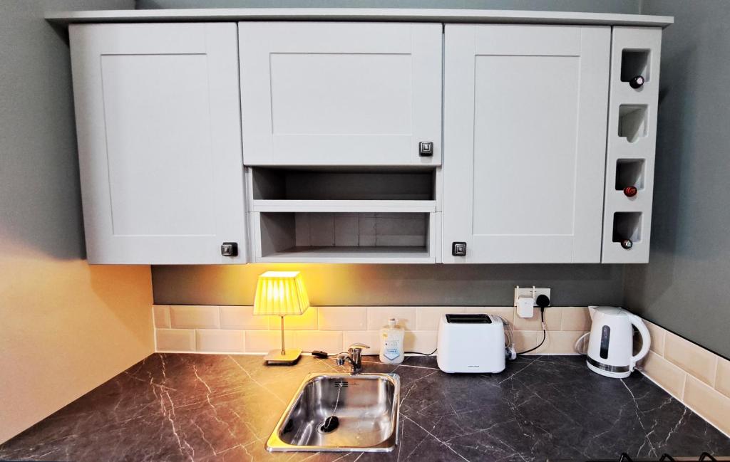 Kuchyň nebo kuchyňský kout v ubytování Golilli Studio Accommodation Clare