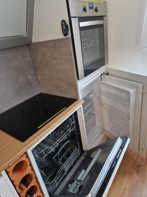 Kuchyň nebo kuchyňský kout v ubytování Apartment feelthenature