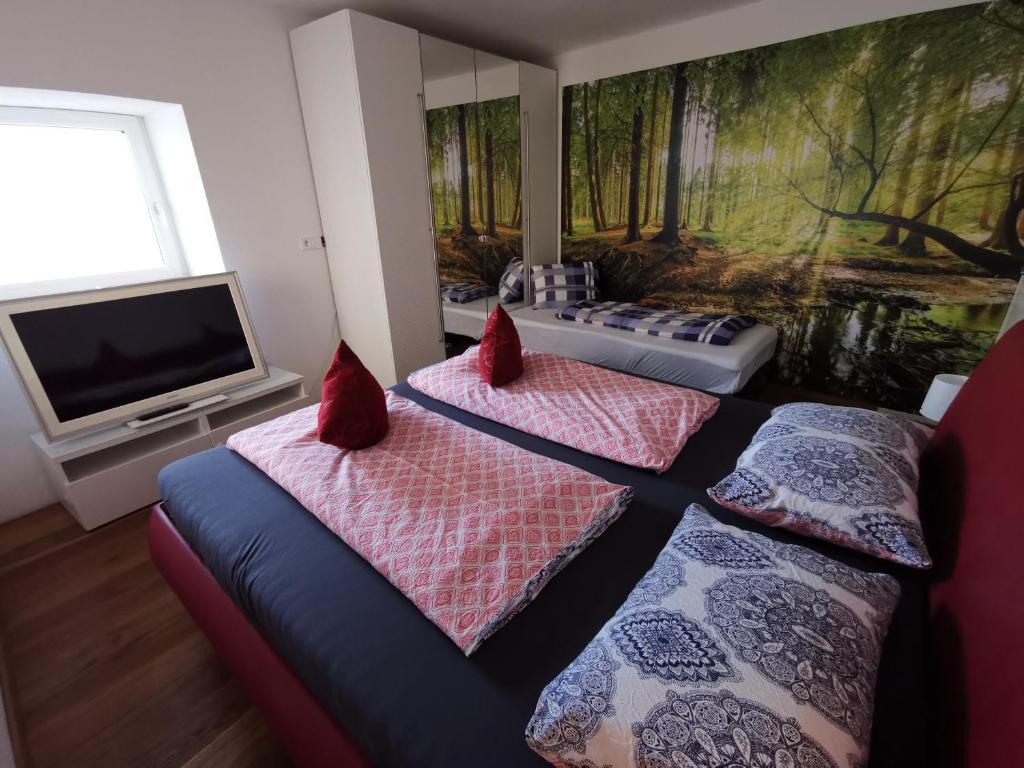 A bed or beds in a room at NICEprice 24h - Private Entrance