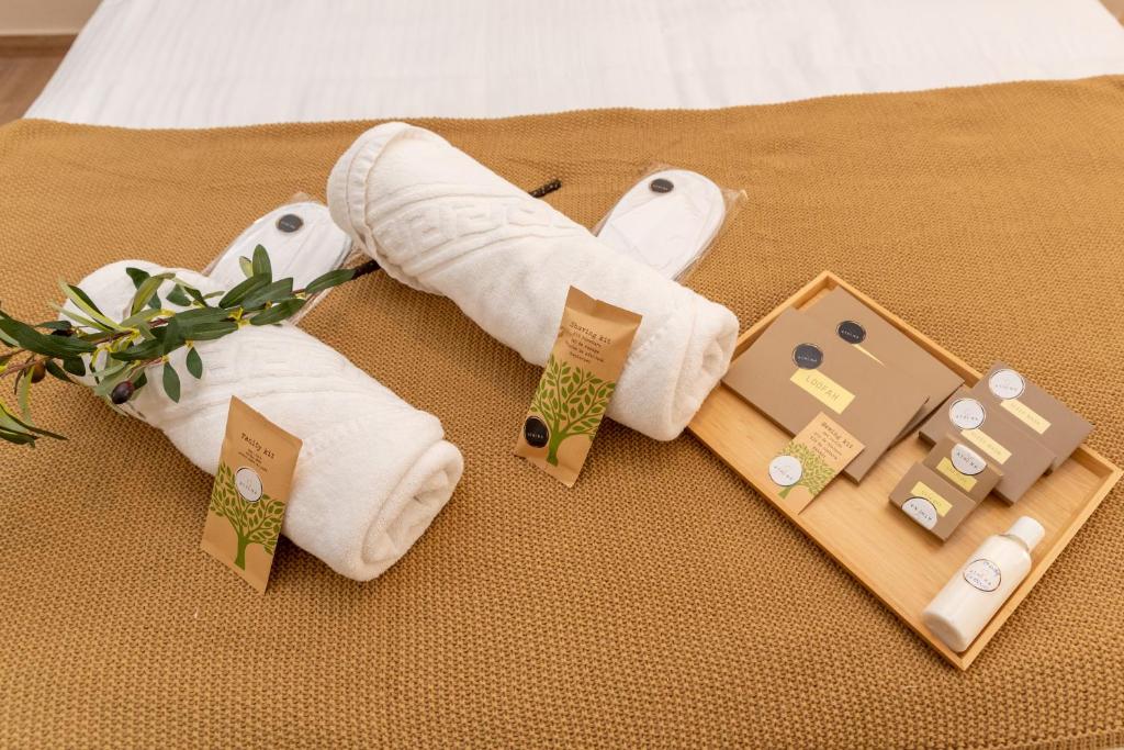 Postel nebo postele na pokoji v ubytování Athena Cocooning Apartment