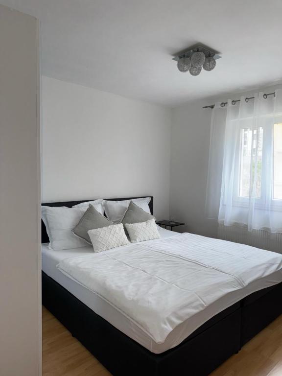 Posteľ alebo postele v izbe v ubytovaní Haus Ella