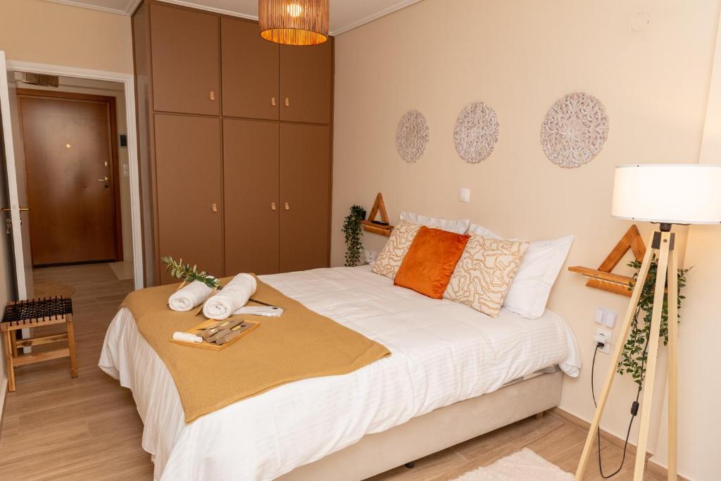 Postel nebo postele na pokoji v ubytování Athena Cocooning Apartment