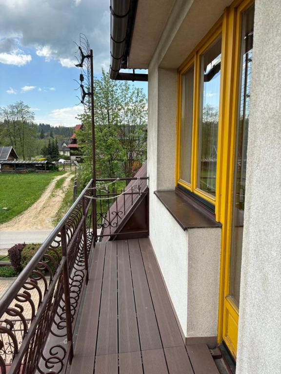 Balkón alebo terasa v ubytovaní Pokoje Gościnne U Gordona