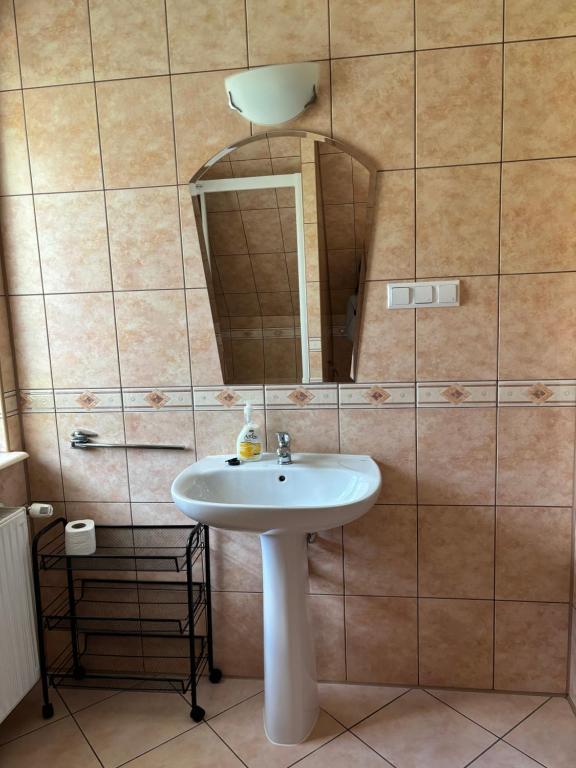 Kúpeľňa v ubytovaní Pokoje Gościnne U Gordona