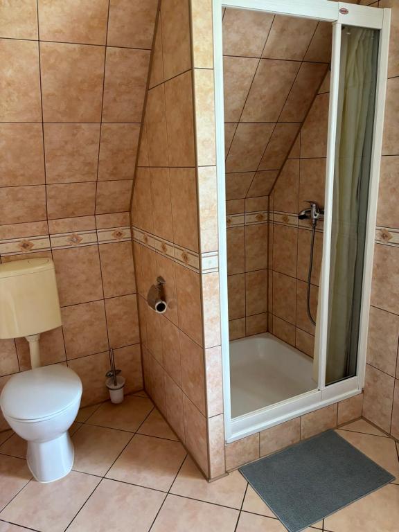 Kúpeľňa v ubytovaní Pokoje Gościnne U Gordona