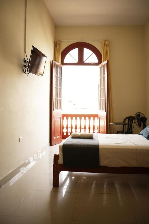 Postel nebo postele na pokoji v ubytování Hotel Estancia Real